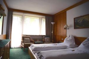 Postel nebo postele na pokoji v ubytování Haus Patricia