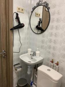 Ванная комната в Kakaduhome Guest Rooms