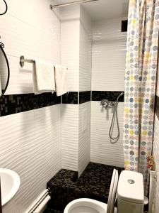 Um banheiro em Kakaduhome Guest Rooms