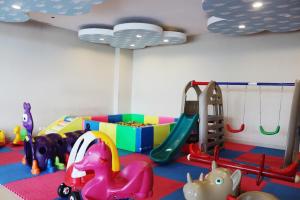 a play room with many different toys in it at The Luxton Cirebon Hotel and Convention in Cirebon