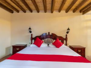 Postel nebo postele na pokoji v ubytování Hacienda Del Angel