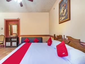 Postel nebo postele na pokoji v ubytování Hacienda Del Angel