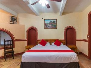 Postel nebo postele na pokoji v ubytování Hacienda Del Angel