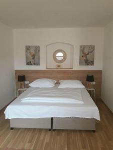 Postel nebo postele na pokoji v ubytování Apartmány Sedmikráska