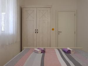 Postel nebo postele na pokoji v ubytování Modern Apartment Doris