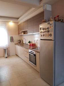 Kuchyň nebo kuchyňský kout v ubytování Modern Apartment Doris