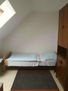 Postel nebo postele na pokoji v ubytování Apartmány Sedmikráska