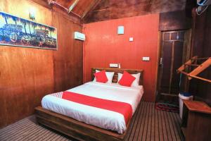 Tempat tidur dalam kamar di Trinco Star Cabana