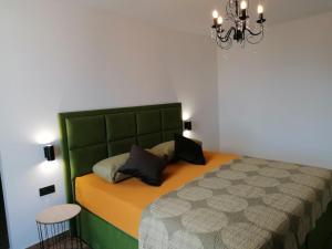 Postel nebo postele na pokoji v ubytování Villa Prova M
