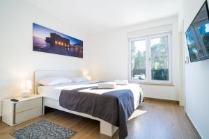 Postel nebo postele na pokoji v ubytování Apartment 'Holiday Above Dubrovnik'