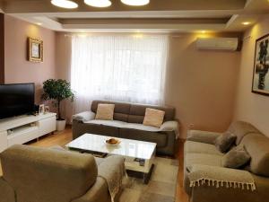 Posezení v ubytování Modern Apartment Doris