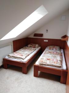 Postel nebo postele na pokoji v ubytování Penzion Zoja