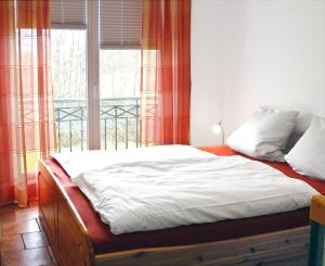 Postel nebo postele na pokoji v ubytování Ostsee Residenz Meeresblick Meeresblick