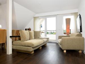 Χώρος καθιστικού στο Landhaus Residenz Kirchsee Sommerloft