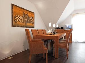Μια τηλεόραση ή/και κέντρο ψυχαγωγίας στο Landhaus Residenz Kirchsee Sommerloft