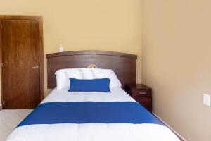 Voodi või voodid majutusasutuse Grand View Suites toas
