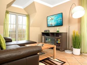 TV a/nebo společenská místnost v ubytování Gollwitzer Park Seeperle