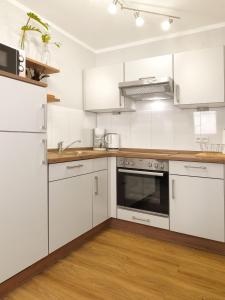 Η κουζίνα ή μικρή κουζίνα στο Haus Südwester Hummer