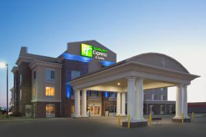 a building with a gazebo in front of it at Holiday Inn Express Hotel & Suites Minot South by IHG in Minot