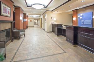 a corridor of a hospital with a waiting room at Holiday Inn Express Hotel & Suites Minot South by IHG in Minot +23 photos