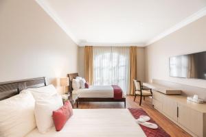 Кровать или кровати в номере Grand Polanco Residencial