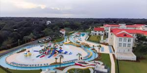 an aerial view of a water park at a resort at Centennial Plaza Resort Gulfport in Gulfport
