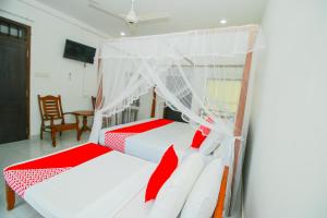 Llit o llits en una habitació de Onaro Beach View