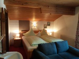 Llit o llits en una habitació de Pension Sonnenhof