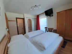 Postel nebo postele na pokoji v ubytování Haus Christine