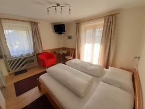 Postel nebo postele na pokoji v ubytování Haus Christine