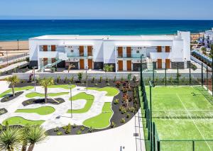 an aerial view of a resort with the beach at Hotel Lava Beach in Puerto del Carmen