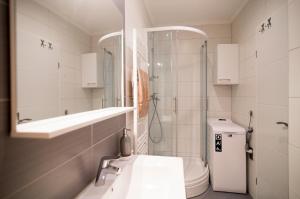 Kúpeľňa v ubytovaní Apartment SunDelight + 12 fotografií