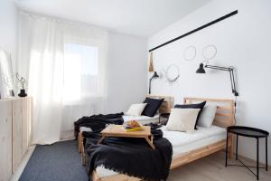 Posteľ alebo postele v izbe v ubytovaní NAP Apartments Długa Grobla