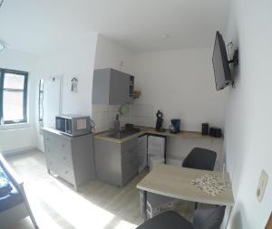 Kuchyň nebo kuchyňský kout v ubytování Haus Fernsicht