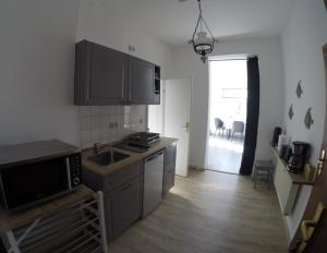 Kuchyň nebo kuchyňský kout v ubytování Haus Fernsicht