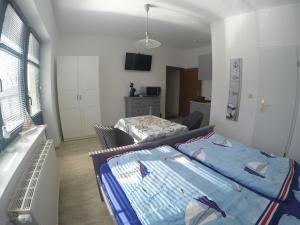 Postel nebo postele na pokoji v ubytování Haus Fernsicht