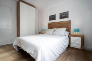Postel nebo postele na pokoji v ubytování Rio de Janeiro Beach - Apartamento a estrenar en primera linea de playa + 17 fotografií