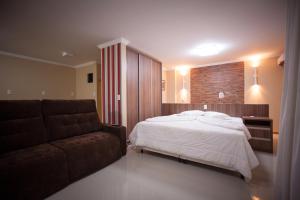Postel nebo postele na pokoji v ubytování Hotel Saint Louis