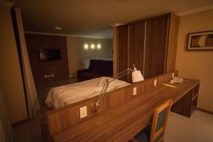 TV a/nebo společenská místnost v ubytování Hotel Saint Louis