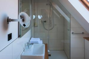 Koupelna v ubytování Lindenhof Hotel Garni + 22 fotografií