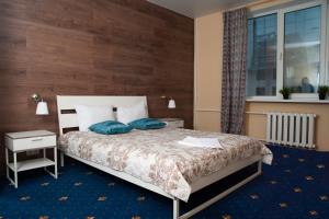 Hostel Nikolskiy tesisinde bir odada yatak veya yataklar