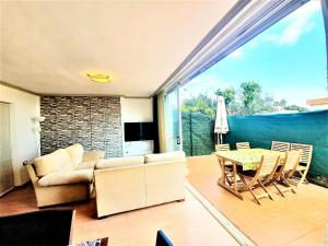 Posedenie v ubytovaní APARTAMENTO CERCA DE PLAYA Y MONTAÑA IDEAL FAMILIAS O RELAX