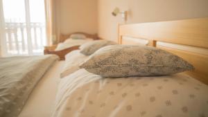 Postel nebo postele na pokoji v ubytování Apartmány U Sjezdovky