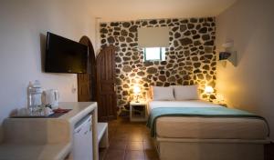Postel nebo postele na pokoji v ubytování Costa Marina Villas