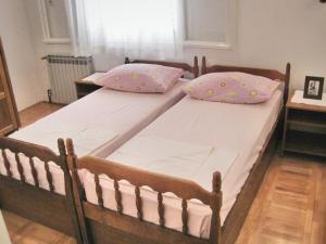 Giường trong phòng chung tại Apartments Mare