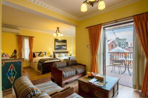 Postel nebo postele na pokoji v ubytování Baber Mahal Vilas - The Heritage Hotel + 37 fotografií