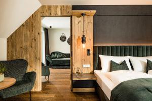 Posteľ alebo postele v izbe v ubytovaní Hotel Touring Dolomites