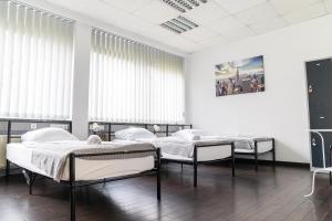 Postel nebo postele na pokoji v ubytování Hostel Messe Laatzen