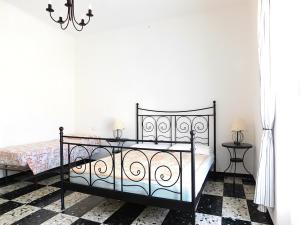 Krevet ili kreveti u jedinici u okviru objekta Spazioso appartamento Vista Mare