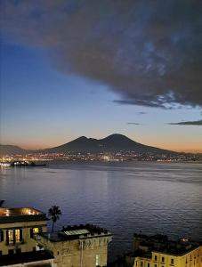 a view of a city and a body of water at Casa Annamaria in Naples